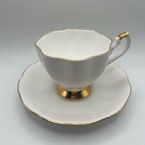 Elegant White and Gold Teacup and Saucer Set